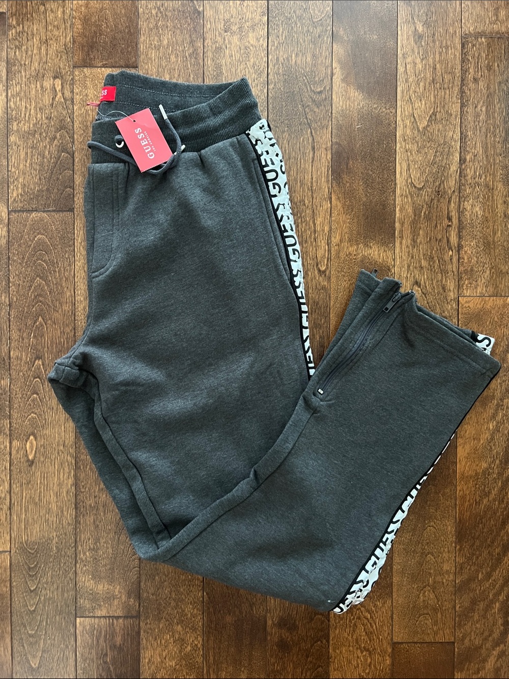 Guess men’s Charcoal Gray Sweat Joggers with Logo Side Tape